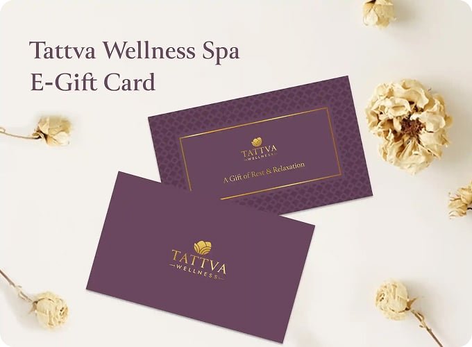 Stonethai Spa purple gift cards with gold text and flowers